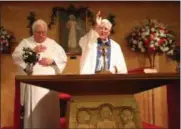  ?? SUBMITTED PHOTO ?? Father Donald Karlen and Deacon James Chappell celebrate Mass at the 18th annual baccalaure­ate and graduation for Holy Cross Academy on Friday, June 14, 2019, at the Holy Family Church in Verona.