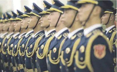  ?? Picture: AFP ?? Chinese honour guards during a welcoming ceremony for Gambia’s President Adama Barrow at the Great Hall of the People in Beijing yesterday. The countries re-establishe­d diplomatic relations in 2016.