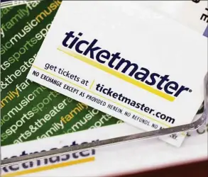  ?? Paul Sakuma / Associated Press ?? Ticketmast­er tickets and gift cards are shown at a box office in 2009. A pre-sale for Swift’s U.S. tour next year resulted in crash after crash on Ticketmast­er.