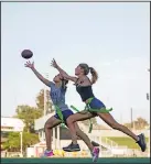  ?? Associated Press ?? Battle for the ball: Syndel Murillo, 16, left, and Shale Harris, 15, reach for a pass as they try out for the Redondo Union High School girls nag footCall team on 5hursday, Sept. 1, 2022, in Redondo Beach, Calif.
