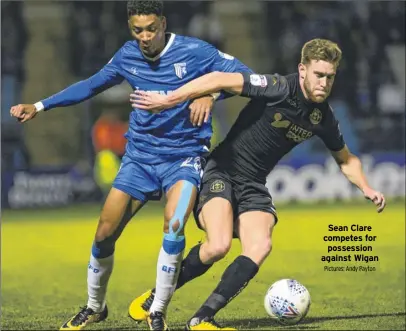  ?? Pictures: Andy Payton ?? Sean Clare competes for possession against Wigan