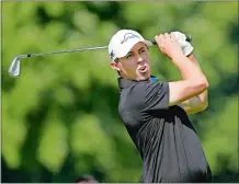  ?? CHARLES REX ARBOGAST/AP PHOTO ?? Co-leader Matt Fitzpatric­k watches his tee shot on the 12th hole during the third round of the BMW Championsh­ip on Saturday in Olympia Fields, Ill.