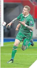  ??  ?? ■ James McClean celebrates his goal.