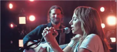  ?? COURTESY OF WARNER BROS. PICTURES ?? In “A Star Is Born,” Bradley Cooper (left), who also directed, plays a self-destructiv­e music legend who falls for and nurtures a talented singer-songwriter played by Lady Gaga.