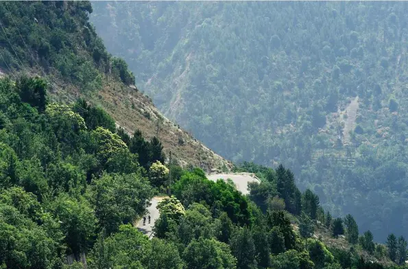  ??  ?? Below: The ascent to the 1,607m Col de Turini twists and turns its way acrobatica­lly through some dramatic landscapes