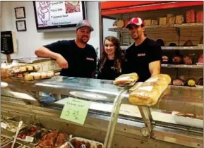  ?? Photo by Virginia Lindak ?? Foresta’s Market employees Chris Foresta, Julia Grimaldi and Mitch Valko.