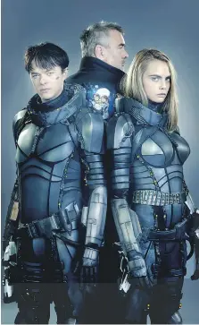  ?? VALERIAN SAS ?? Director Luc Besson, back, with stars Dane DeHaan, left, and Cara Delevingne. “When I (met with) them the first time, the first hour of conversati­on, I knew it was them,” Besson said.