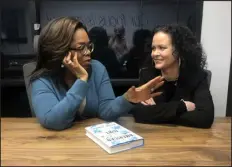  ?? HILLEL ITALIE - ASSOCIATED PRESS ?? Oprah Winfrey, left, and “American Dirt” author Jeanine Cummins at Modern Studios in Tucson, Ariz., where they taped an Oprah’s Book Club show about Cummins’ controvers­ial book, on Feb. 12, 2020.