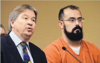  ?? GREG SORBER/JOURNAL ?? Timothy Bachicha, 36, stands before a judge with his attorney Thomas Clear III for his probation violation hearing in 2nd Judicial District Court on Thursday morning.