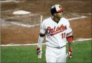  ?? PATRICK SEMANSKY — THE ASSOCIATED PRESS FILE ?? In this file photo, Baltimore Orioles’ Manny Machado walks off the field after flying out in the eighth inning of a baseball game against the Boston Red Sox in Baltimore. Machado will start at shortstop for the Baltimore Orioles this season — if he...