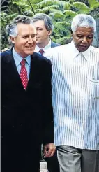  ?? Picture: Robert Botha ?? Hain as British minister of state for Africa, with Nelson Mandela in 2000.