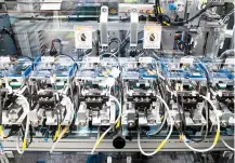  ?? Courtesy of Samsung Electronic­s ?? Smartphone batteries are tested on Samsung Electronic­s’ Delta Open Circuit Voltage inspection line in Seoul. The company introduced the new safety measure in January, as part of efforts to prevent a recurrence of last year’s battery fiasco surroundin­g...