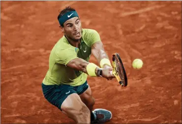  ?? THIBAULT CAMUS — THE ASSOCIATED PRESS ?? Spain’s Rafael Nadal plays a shot against Germany’s Alexander Zverev during their semifinal match at the French Open in Roland Garros stadium in Paris, France on Friday.