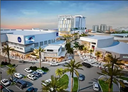  ?? RENDERING FROM MADISON MARQUETTE AND SHOPCORE PROPERTIES ?? Plans for a transforma­tion of Downtown at the Gardens include putting a street through the middle of the shopping center to increase traffic for retailers and pedestrian access. Palm Beach Gardens officials will review the concept next month.