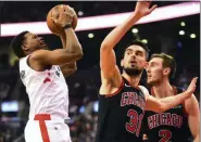  ?? FRANK GUNN - THE ASSOCIATED PRESS ?? Toronto Raptors guard Kyle Lowry (7) looks to shoot as Chicago Bulls guard Tomas Satoransky (31) and Luke Kornet (2) look on during first-half action in Toronto, Sunday, Feb. 2, 2020.