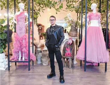  ?? Tyler Sizemore/Hearst Connecticu­t Media ?? Fashion designer Christian Siriano poses at the post-Fashion Week party at the Christian Siriano boutique in Westport on Thursday, March 14.