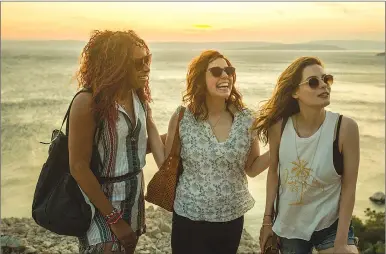  ?? Associated Press photo ?? This image released by Netflix shows from left, Phoebe Robinson, Vanessa Bayer and Gillian Jacobs in a scene from “Ibiza.”