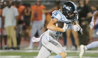  ?? STEPHEN M. DOWELL/ORLANDO SENTINEL ?? Hagerty High’s Ian Miller caught the game-winning touchdown pass with time running out against Spruce Creek on Friday.