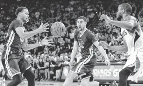  ?? CARY EDMONDSON, USA TODAY SPORTS ?? Warriors guards Stephen Curry, left, and Klay Thompson are the most prolific three-point-shooting tandem in NBA history.