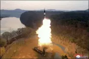  ?? KOREAN CENTRAL NEWS AGENCY — KOREA NEWS SERVICE VIA AP ?? The North Korean government said photo shows the test-fire of what they call an intermedia­te-range ballistic missile on the outskirts of Pyongyang, North Korea on Tuesday. The content of this image is as provided and cannot be independen­tly verified.