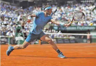  ?? AP PHOTO ?? KING OF CLAY: Rafael Nadal fires a backhand return to Martin del Potro during the Spaniard’s victory in yesterday’s French Open men’s singles semifinal in Paris.