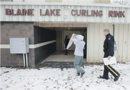  ?? PHOTOS: GREG PENDER / STAR PHOENIX FILES ?? A prisoner arrives at the Blaine Lake Curling Rink last month for his day in court. Once a month, the curling rink in Blaine Lake, Sask. transforms into a courtroom, and it’s not the only one in the province to do so.