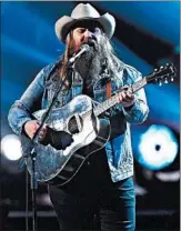  ?? GARETH CATTERMOLE/GETTY ?? Chris Stapleton, shown Feb. 21 at the BRIT Awards, is up for eight Academy of Country Music Awards.