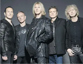  ?? DONOVAN PUBLIC RELATIONS ?? Guitarist Phil Collen, second from left, says the secret to Def Leppard’s longevity is simple: “We get to write songs, be really creative and actually be rewarded for it.”