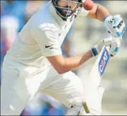  ?? AFP ?? ▪ Set for his Test debut against South Africa at Nagpur in 2010, Rohit hurt his ankle and had to wait three years for another chance.