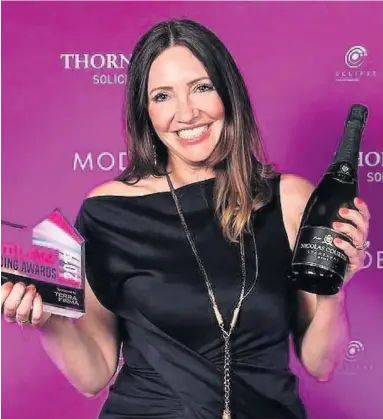  ??  ?? Perfect Portal’s founder and CEO Yvonne Hirons celebrates at the awards event