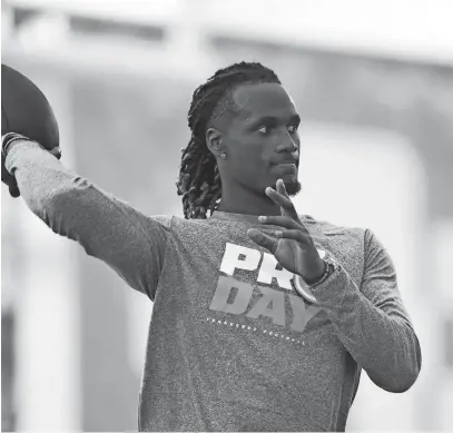  ?? ?? Joe Milton throws a pass at Tennessee pro day on Wednesday in Knoxville.