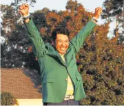  ?? AFP ?? Hideki Matsuyama celebrates with his green jacket after winning the 2021 Masters.
