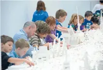  ?? Photo: Dunedin Public Art Gallery ?? Blockheads: Children work on Olafur Eliasson’s Cubic Structural Evolution Project.