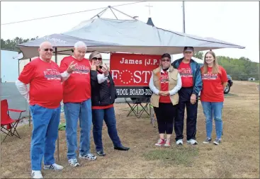  ??  ?? Supporters of James “J.P.” Foster manned a campaign tent at Lake Creek Baptist Church.