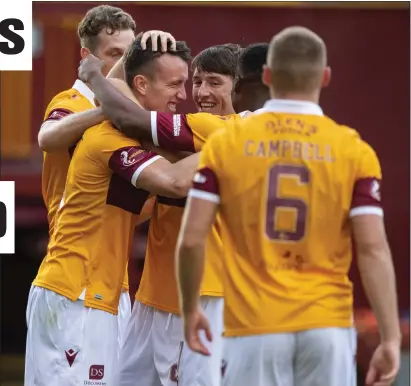  ??  ?? David Turnbull celebrates with his Motherwell team-mates after scoring his first goal in 15 months