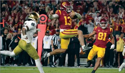  ?? (AP PHOTO/MARK J. TERRILL) ?? USC QB Caleb Williams is the favorite to win the Heisman Trophy after leading the Trojans past No. 17 UCLA (No. 17 CFP ) and No. 19 Notre Dame (No. 21 CFP) the last two weeks. Williams has 34 touchdown passes with only three intercepti­ons and has also rushed for 10 scores.