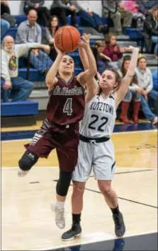  ?? DENNIS KRUMANOCKE­R - FOR DIGITAL FIRST MEDIA ?? Brandywine’s Hannah Fenstermac­her drives past Kutztown’s Rachael McCoach on her way for two.