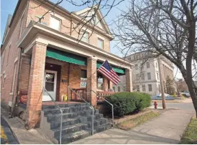  ??  ?? Attorney Michael Mearan’s home/office is convenient­ly next to the Scioto County Courthouse, where he often defends people who are accused of drug offenses.