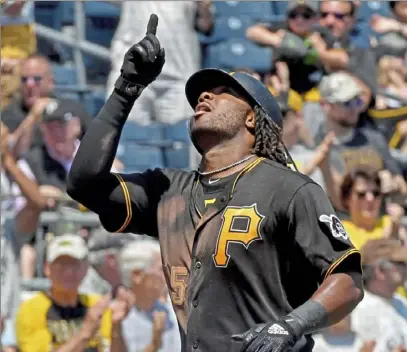  ?? Matt Freed/Post-Gazette ?? The play of first baseman Josh Bell, who has 14 home runs and 44 RBIs a quarter of the way through the season, is the chief reason the Pirates have managed to stay afloat above .500 this season.