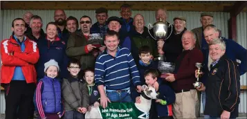  ??  ?? Garrett Hartigan, ICC representa­tive, Berkie Browne, Tony Delhunty,Jimmy Prendivill­e and Ned Browne pictured after presenting the cup to Garrett Hartigan when his dog, Domain King, won the John Prendivill­e Cup at Listowel Coursing on Sunday. Photos by...