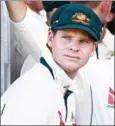  ?? MARTY MELVILLE/AFP ?? Ex-Australia captain Steve Smith (pictured), David Warner and Cameron Bancroft have been banned from cricket over a ball-tampering scandal.