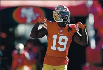  ?? NHAT V. MEYER — BAY AREA NEWS GROUP, FILE ?? The 49ers’ Deebo Samuel (19) heads on to the field before their game against the Cardinals at Levi’s Stadium in Santa Clara on Nov. 17.