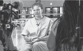  ?? JARRAD HENDERSON, ?? The Re-entry Project team interviews Candace Harp-Harlow, an inmate at Oklahoma’s Mabel Bassett prison.