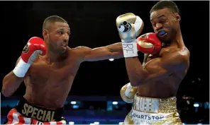  ??  ?? ACCURATE: Brook sticks a jarring jab on Spence’s jaw