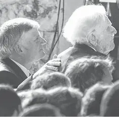  ?? JOHN FLETCHER, AP ?? The Rev. Franklin Graham, left, and his father, the Rev. Billy Graham, at a service in Montreat, N. C., in 2013.