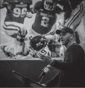  ?? RICH JANZARUK/HERALD TIMES ?? New offensive coordinato­r Rod Carey address the media inside the team room at Memorial Stadium on Wednesday.