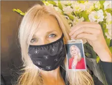  ?? Cami Christense­n ?? Westgate Las Vegas General Manager Cami Christense­n is ready for the hotel’s June 18 reopening. Masked staffers will wear portraits of themselves smiling so guests will know what they look like.
