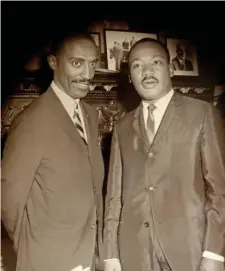  ??  ?? A SUBLIME LIFE: The Rev. Michael Haynes meets with the Rev. Martin Luther King Jr. Haynes, a longtime pillar of the Roxbury community, died last week at 92.