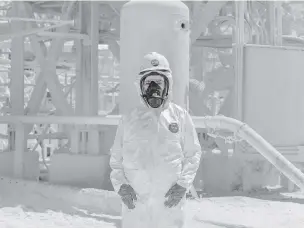  ?? MARCOS ZEGERS/NEW YORK TIMES ?? A worker at an SQM lithium processing plant near Antofagast­a, Chile, earlier this month.