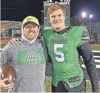  ?? PATRICK CARLISLE ?? Robbie Roper, with Roswell High offensive coordinato­r Patrick Carlisle, died in December at 18.